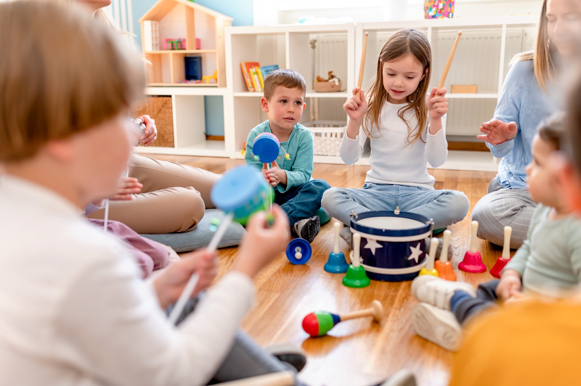 Preschool Children Playing Music Using Various Colorful  Instruments